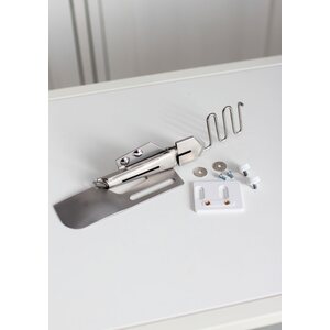 Kantinkääntäjä JUKI -peitetikkikoneeseen